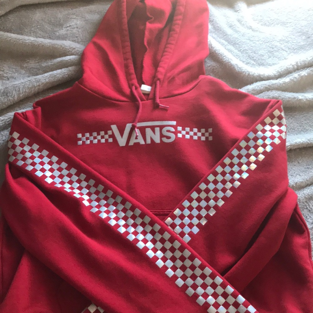Vans hoodie with silver checkered sleeves.